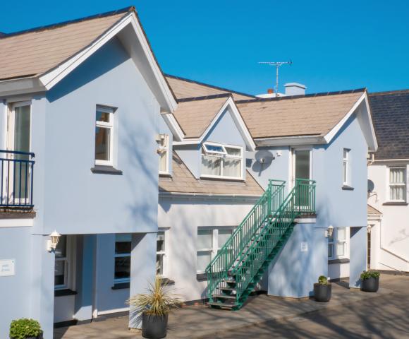 blue building with external stairs