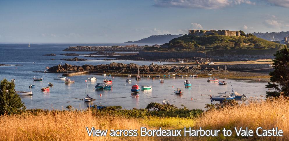 view across Bordeaux Harbour to Vale Castle