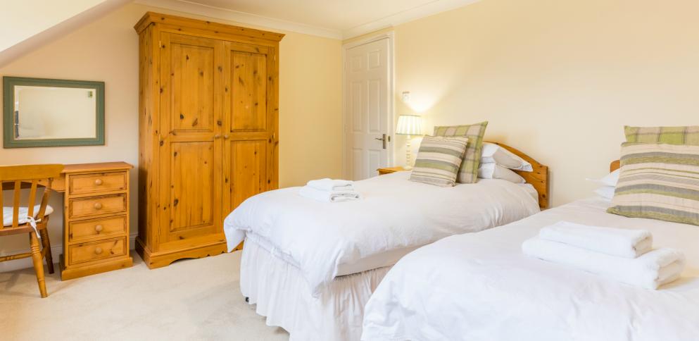 Twin room at the back of the 3 bedroom apartment at The Ellingham Cottages