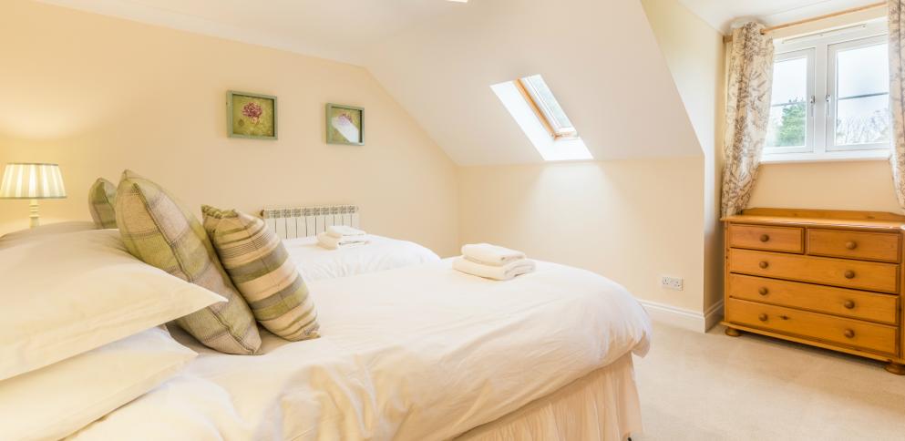 back twin room in the three bed apartment at The Ellingham Cottages