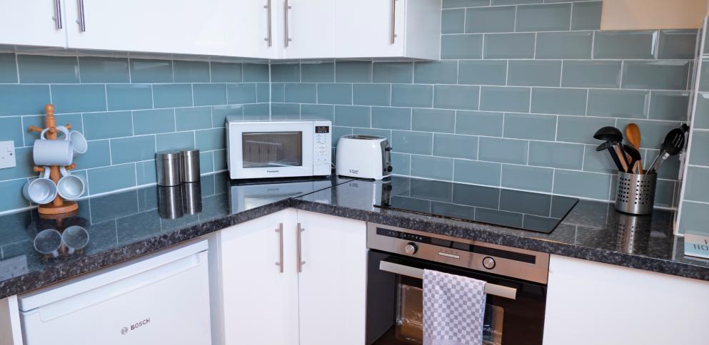 kitchen with blue tiles