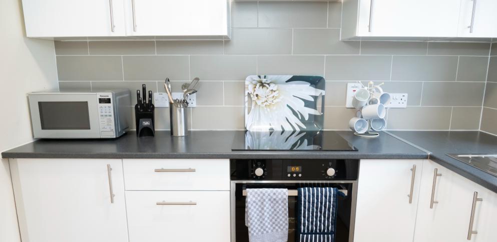 kitchen with white units