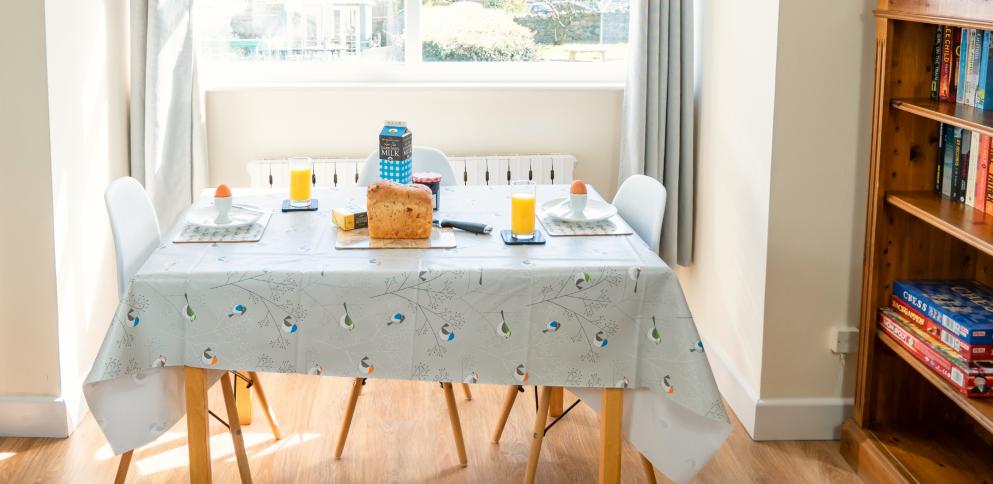 dining table set up for breakfast