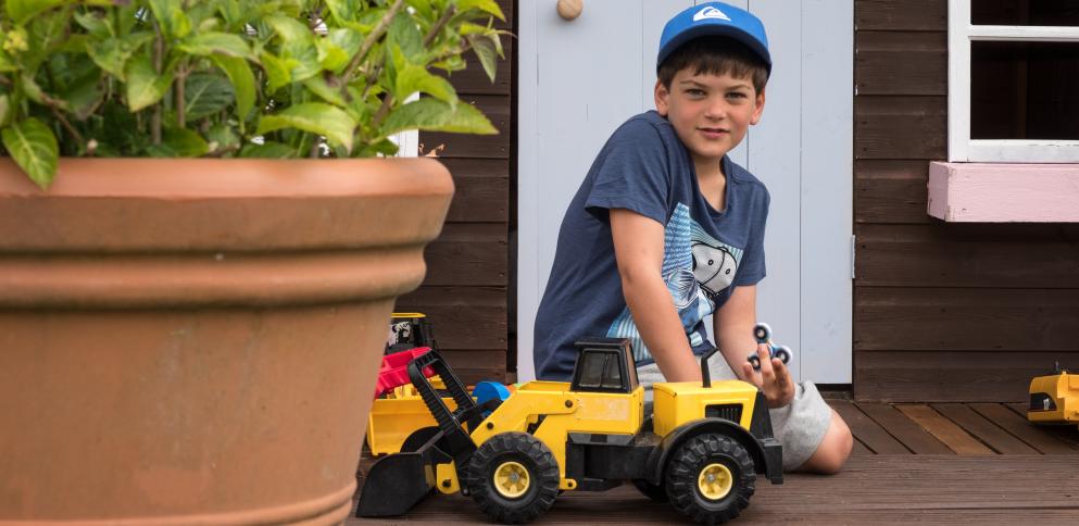 Boy playing with toys 