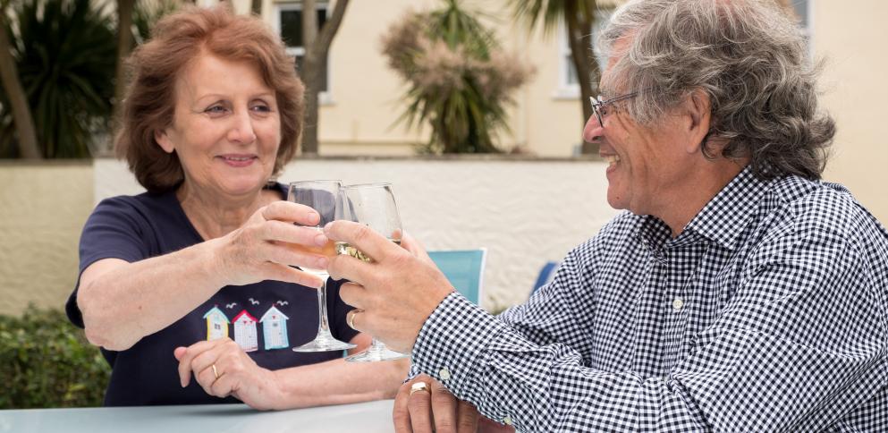 couple drinking wine outside