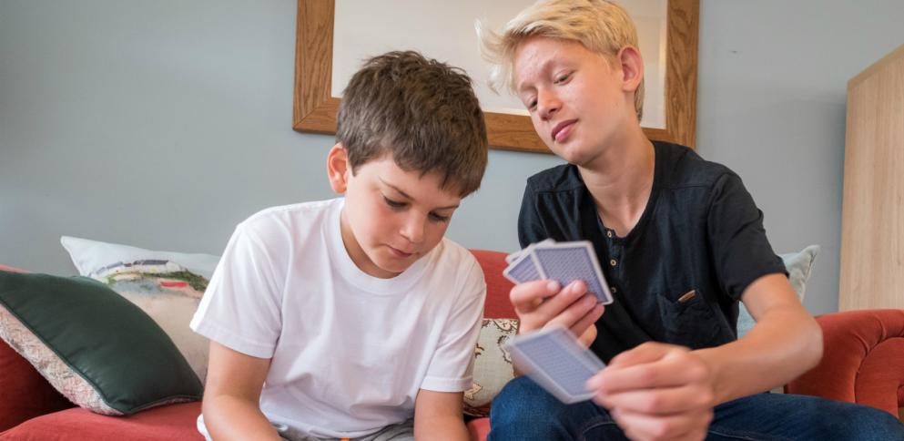 boys playing cards