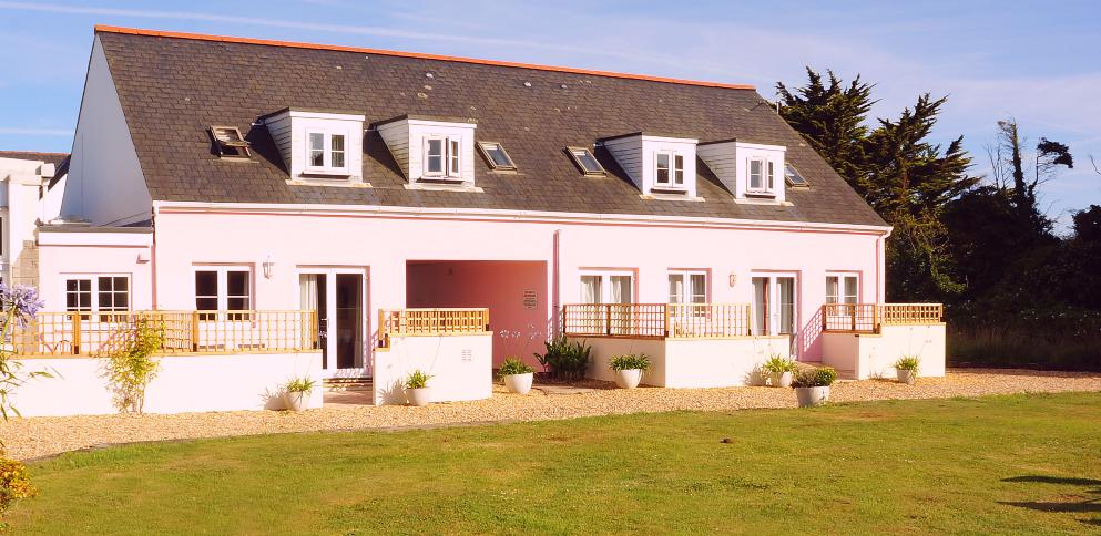 view of the back garden with cottages