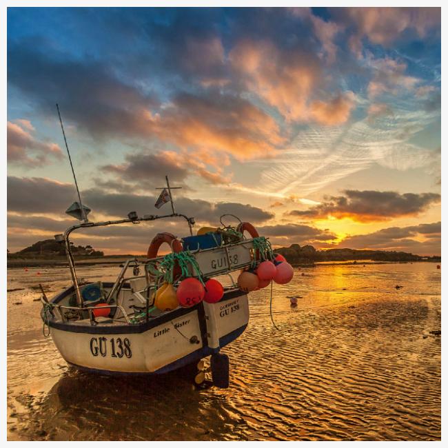 Fishing boat in sunset