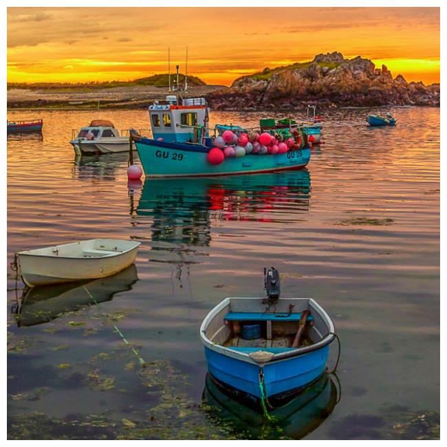 Fishing boats in sunset