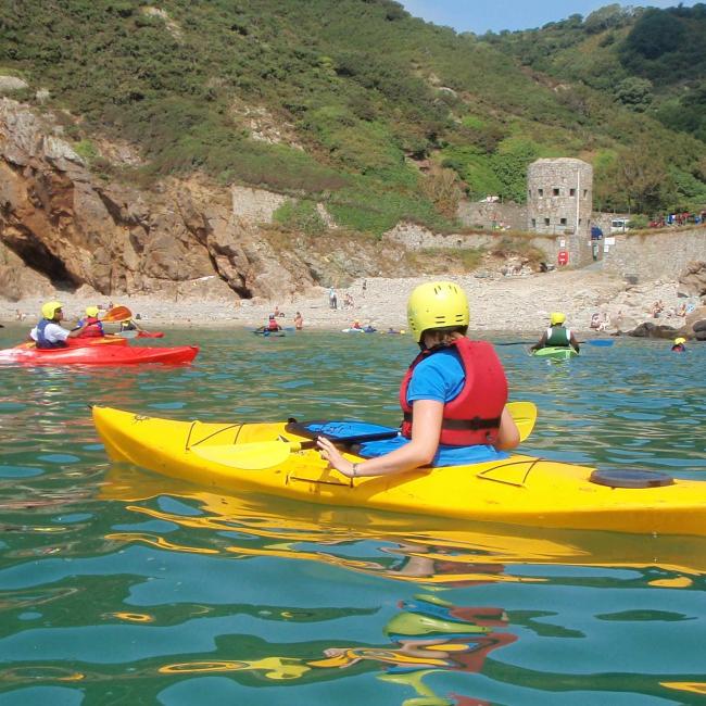 man kayaking at Petit Port