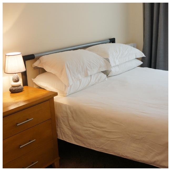 Master bedroom at the Ellingham Apartments at Bordeaux